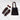 Brown Archies flip flops, black bag with brown handles, and sunglasses on a white wooden floor.